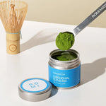 Romi Matcha Ceremonial Blend #01 30g tin with matcha in a measuring spoon