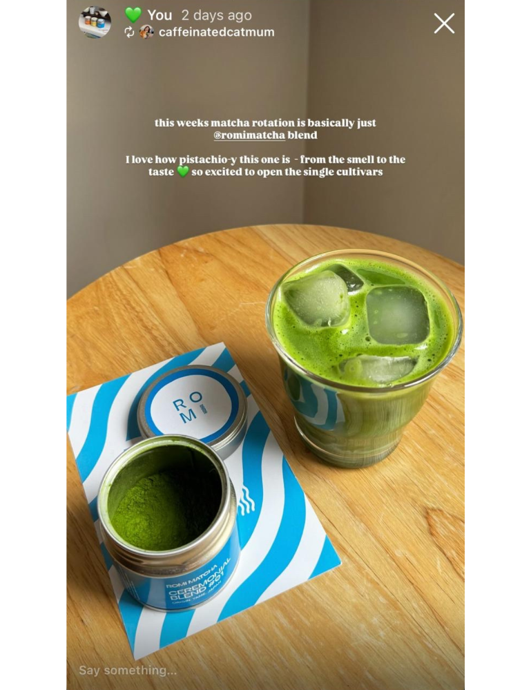Romi matcha in tins and a glass of matcha