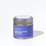 Tea canister with purple Romi Matcha label on a white background