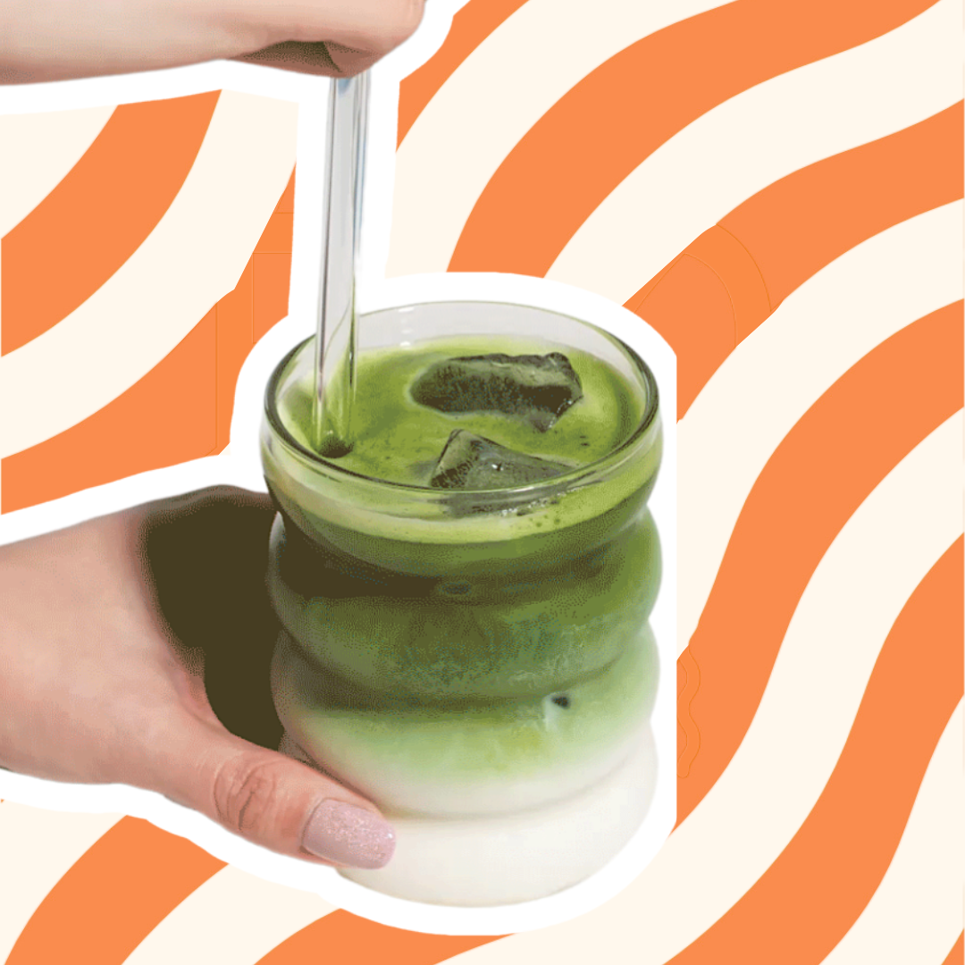 matcha latte with hands holding the glass | Romi Matcha