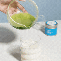 pouring matcha into milk for matcha latte | Romi nutty matcha