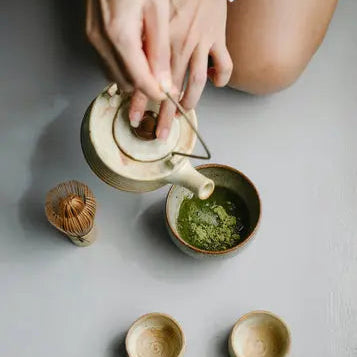 japanese tea matcha with kettle and cups 