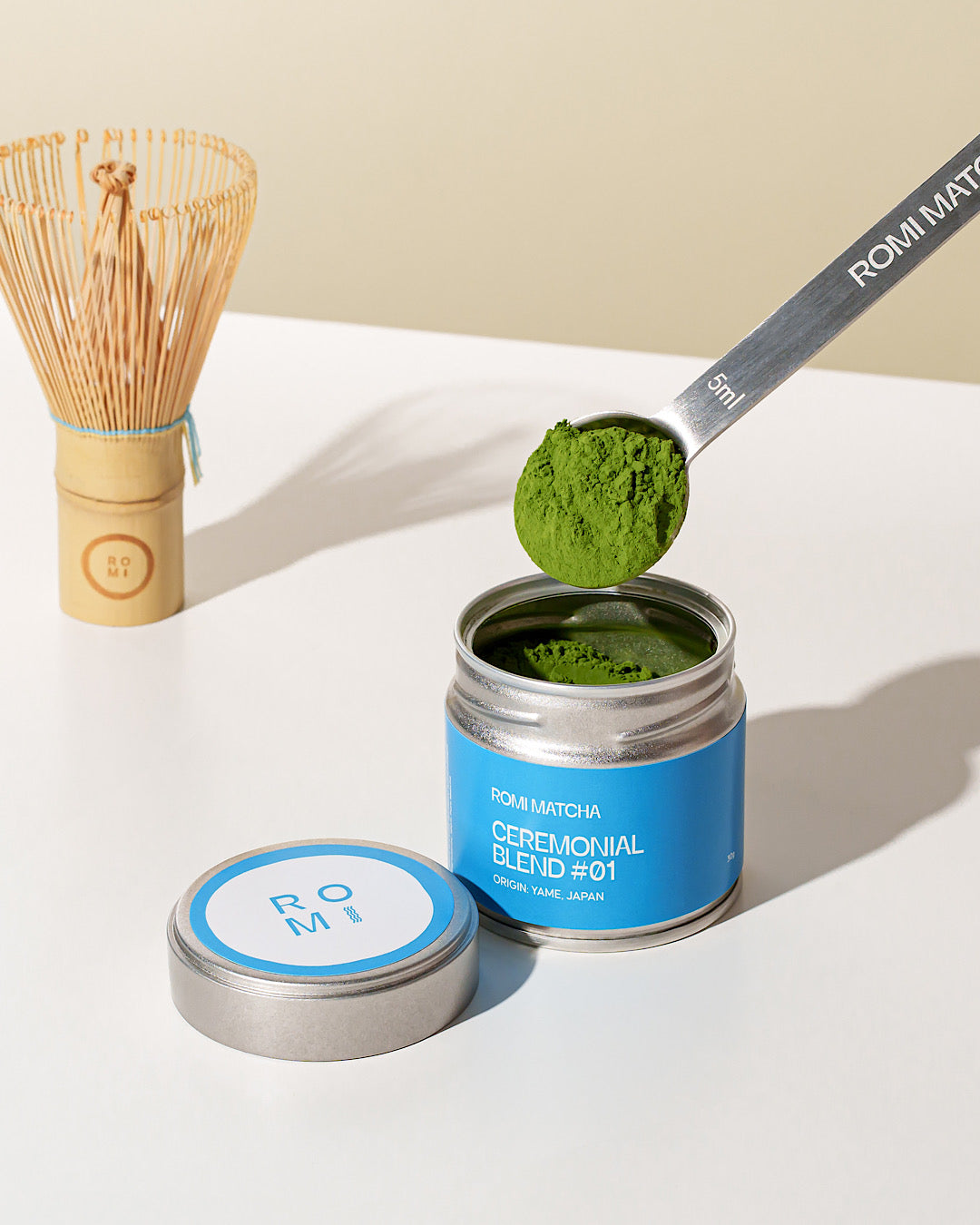 Romi Matcha Ceremonial Blend #01 30g tin with matcha in a measuring spoon
