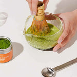 Romi Matcha Okumidori Single Cultivar with matcha in a bowl and bamboo whisk | Romi Matcha