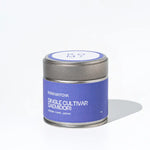 Tea canister with purple Romi Matcha label on a white background