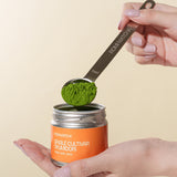 Romi Matcha Single Cultivar Okumidori - 30g tin with matcha powder inside spoon